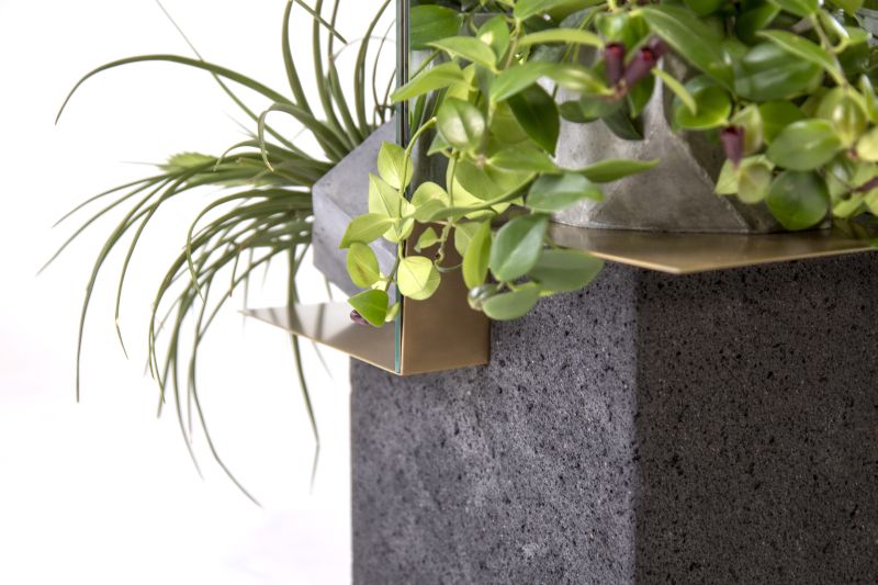 Volcanic stone base with concrete planters 