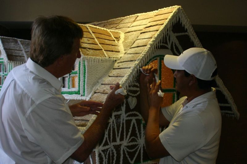 Mike Hudgsonand his assistants Bent olsen and Louis Rojas makes Edible gingerbread house 