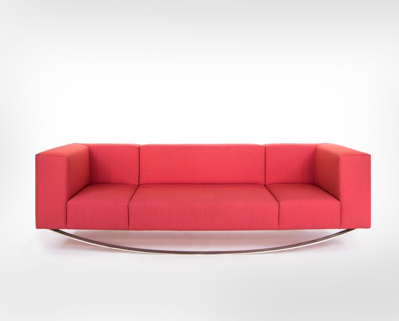 modern sofa rocking on flattened steel bars 