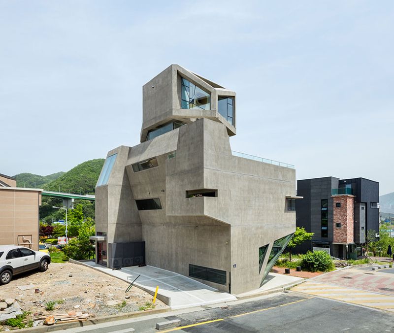 Moon Hoon builds angled concrete house in shape of an owl 