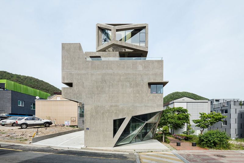 Moon Hoon builds angled concrete house in shape of an owl 