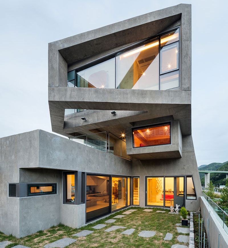 Moon Hoon builds angled concrete house in shape of an owl 