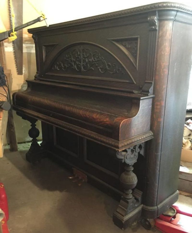 This guy repurposed old piano into DIY piano desk 