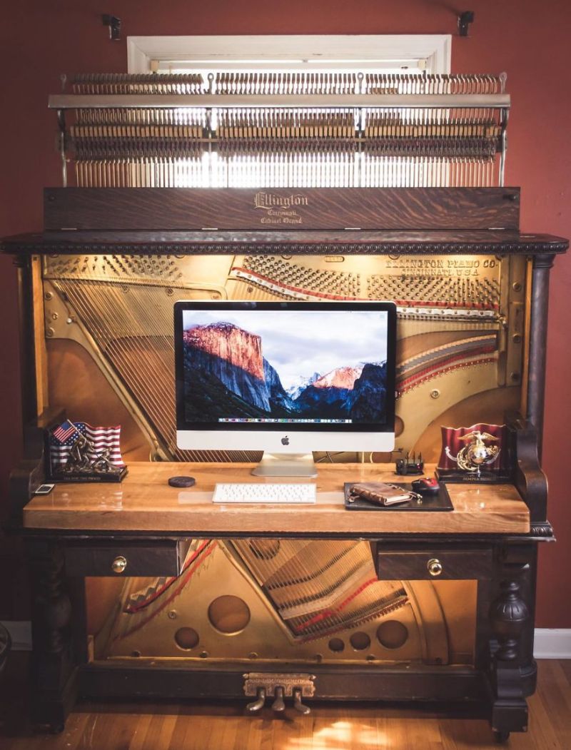 This guy repurposed old piano into DIY piano desk 