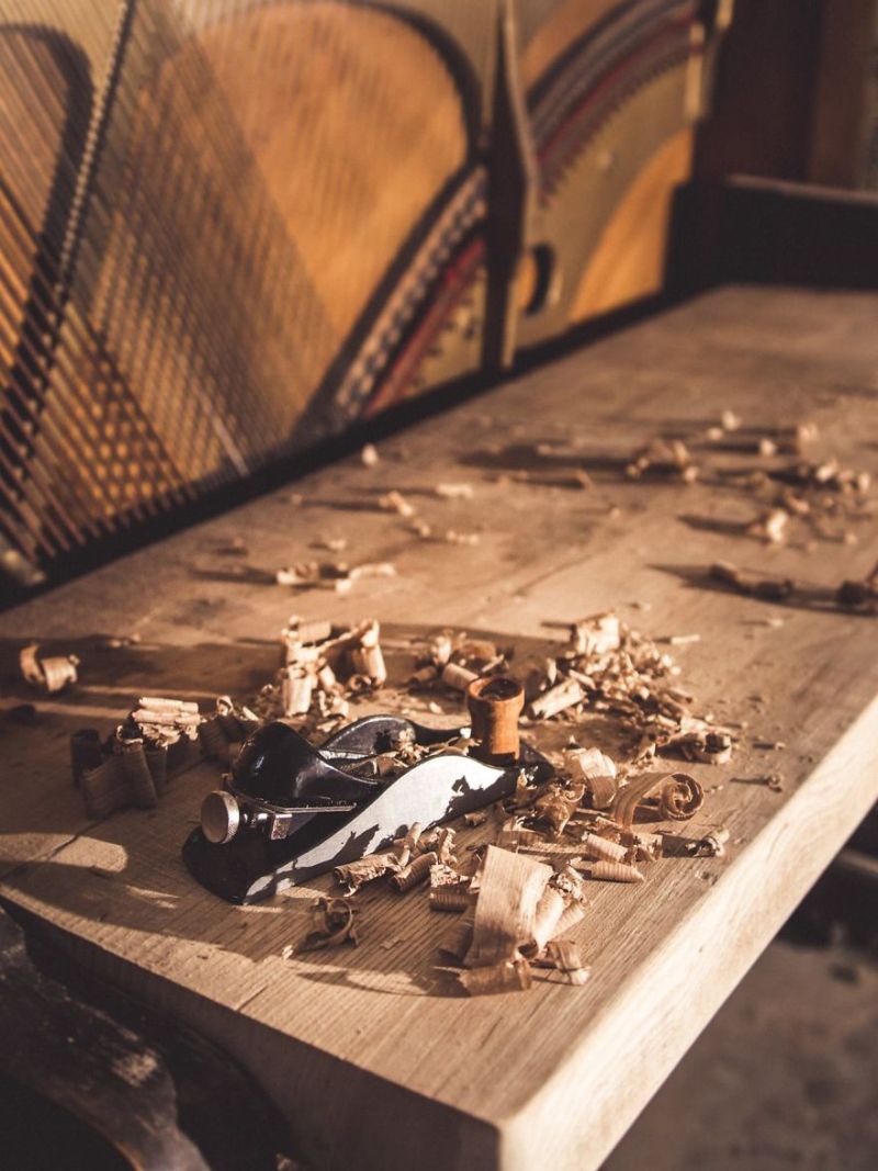 This guy repurposed old piano into DIY piano desk 