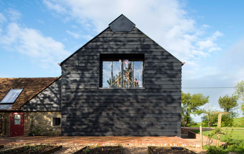 The Ancient Party Barn features mechanically operated openings