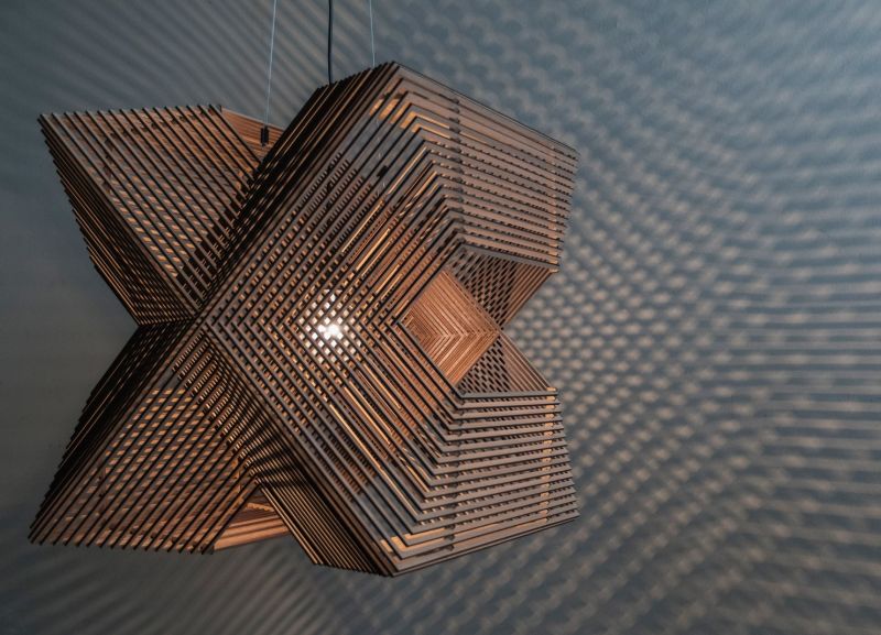 The Angles pendant lamp is perfect harmony of laser-cut wooden rectangles