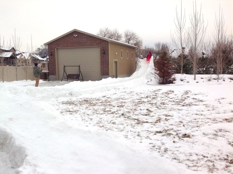 Utah dad builds 300-feet backyard luge run for his kids