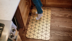 Airea wood block floor mat by Sitskie calms your legs