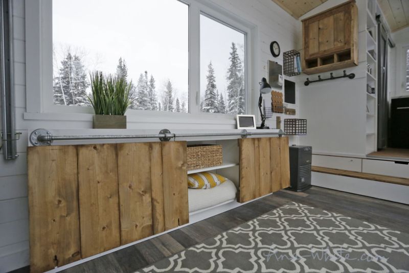 Ana White’s open concept tiny house features elevator bed to save space 