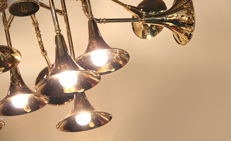 Botti Chandelier by Delightfull consists of multiple trumpet bells 