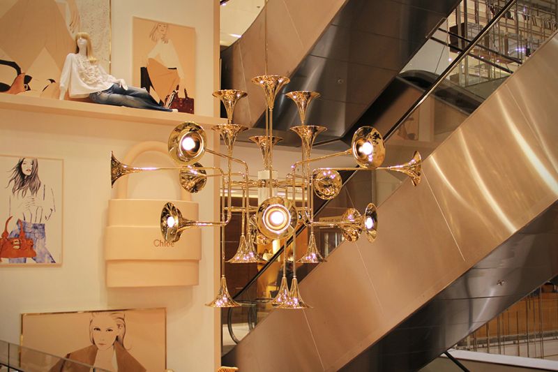 Botti Chandelier by Delightfull consists of multiple trumpet bells 