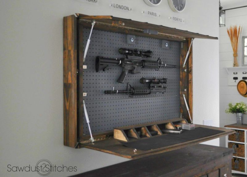 Mirror gun cabinet by Corey