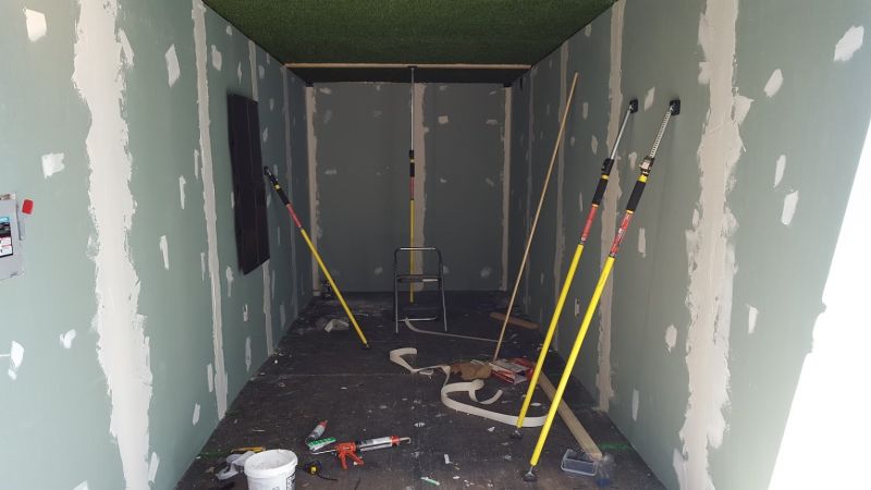 Man transforms shipping container into an underground party bunker 