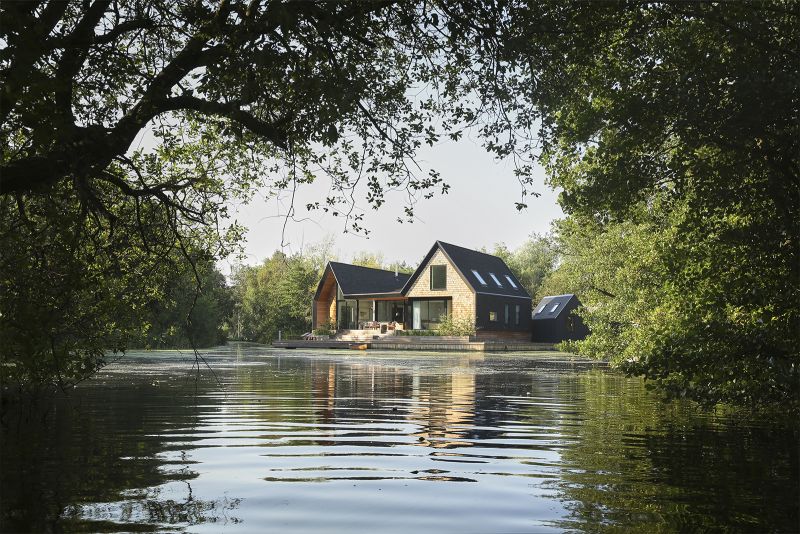 Backwater is a waterside house located across a private lagoon 