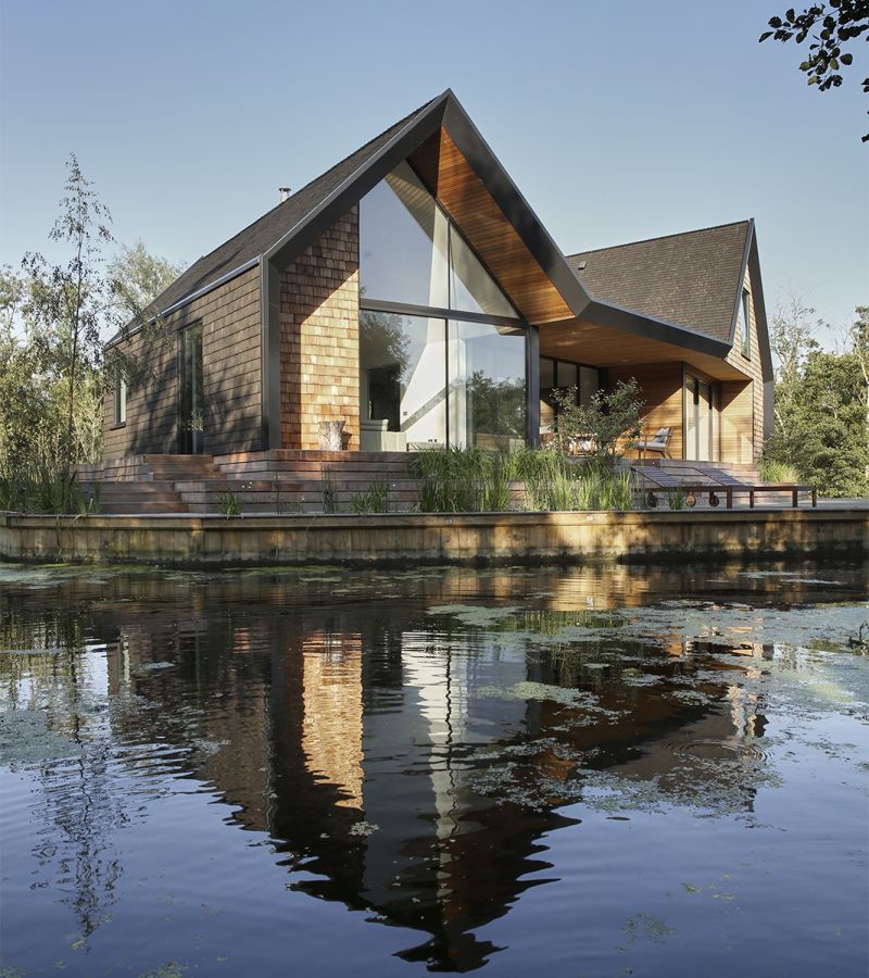 Backwater is a waterside house located across a private lagoon 