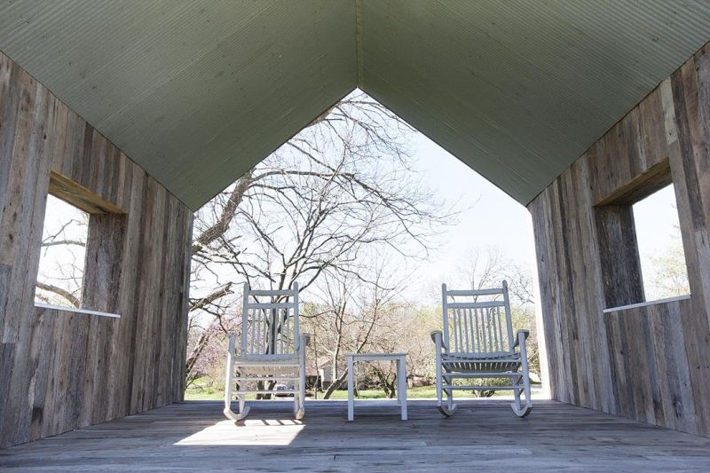 Cloud House: Reclaimed wood shed harvests rainwater to create artificial rainfall 