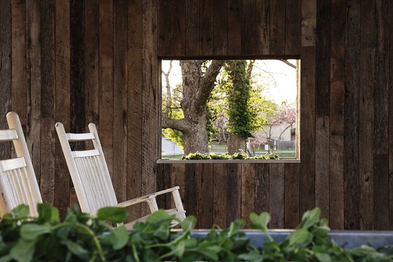 Cloud House: Reclaimed wood shed harvests rainwater to create artificial rainfall 