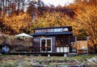 Daigo designs tiny off-grid cabin in Japanese woods