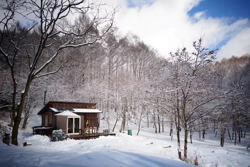 Daigo designs tiny off-grid cabin in Japanese woods 