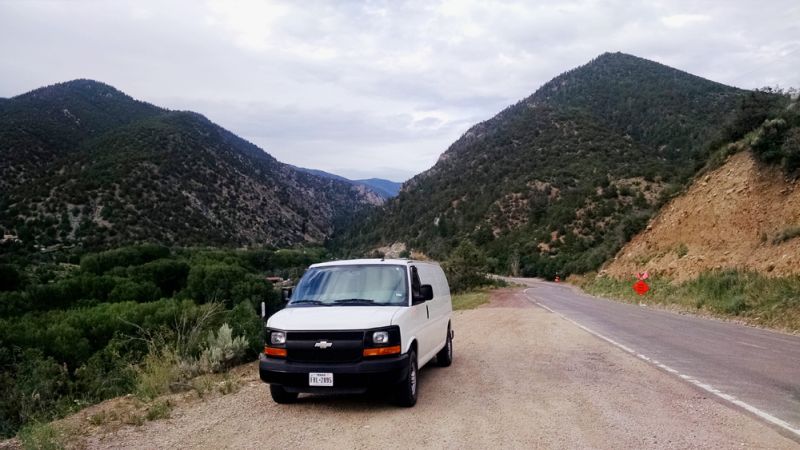 Ross Lukeman transforms cargo van into cozy home with office 