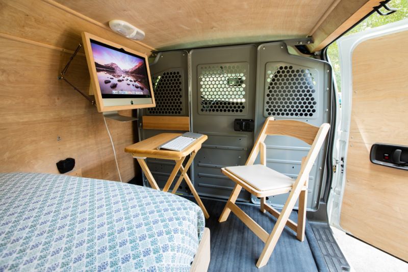 Ross Lukeman transforms cargo van into cozy home with office 