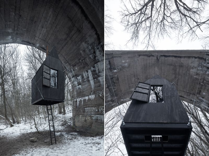 Take a tour of mysterious tiny house floating under an old railway bridge