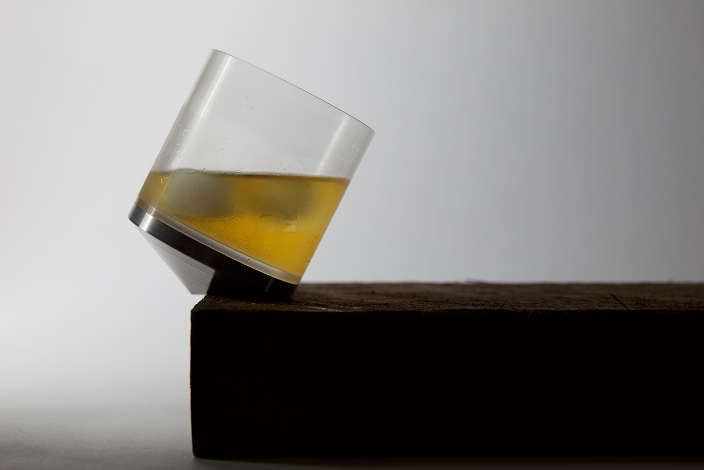 Tipsy rocking whisky glass by Pezanne Khambatta