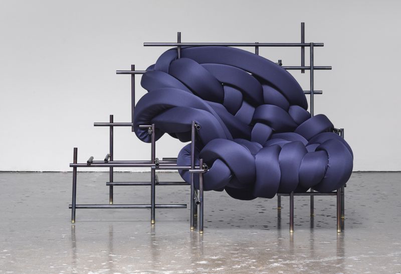 Lawless Chair by Evan Fay consists of foam ribbons interwoven in metal frame 