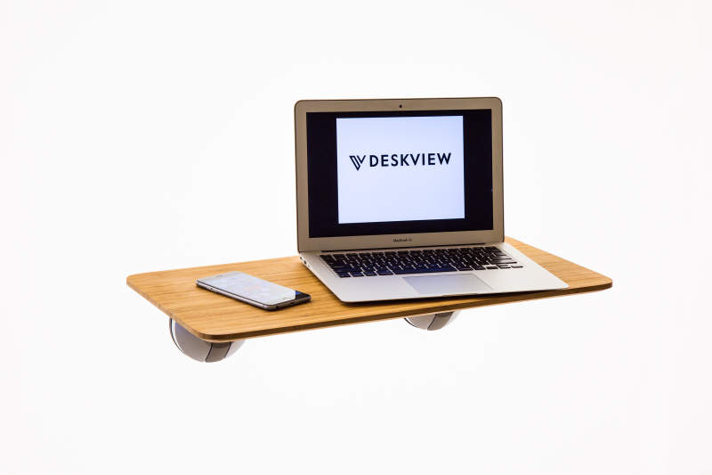 Deskview is a window-mounted adjustable standing desk 