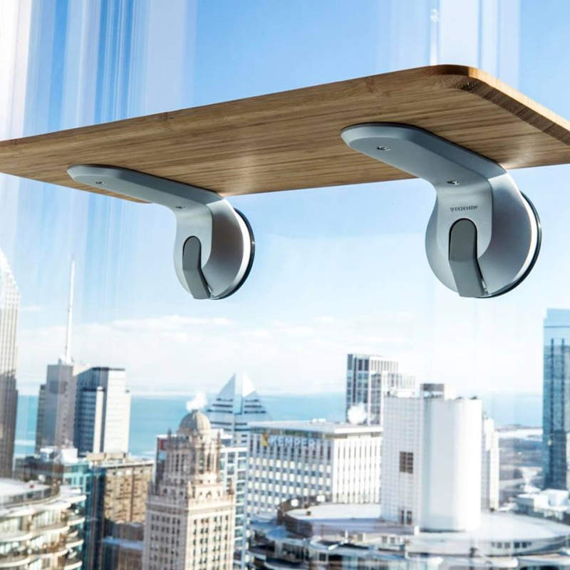 Deskview is a window-mounted adjustable standing desk 