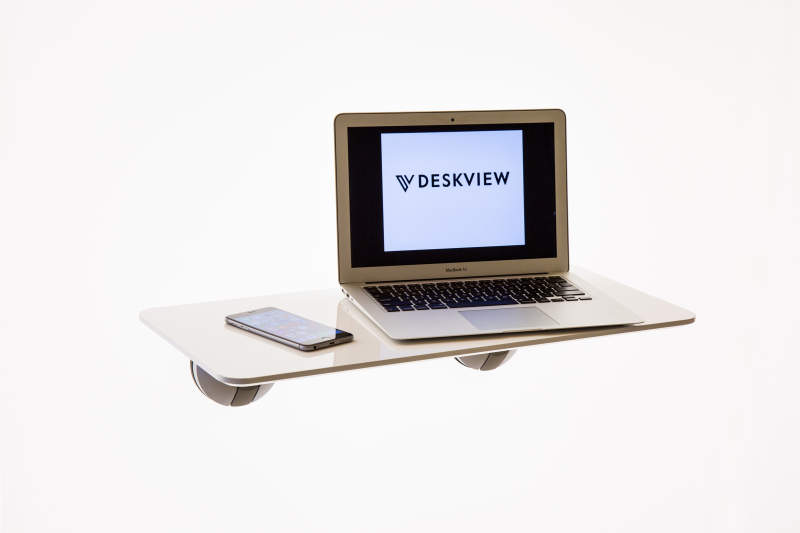 Deskview is a window-mounted adjustable standing desk 