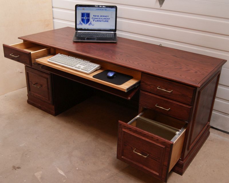 Gun safe behind the pull out keyboard