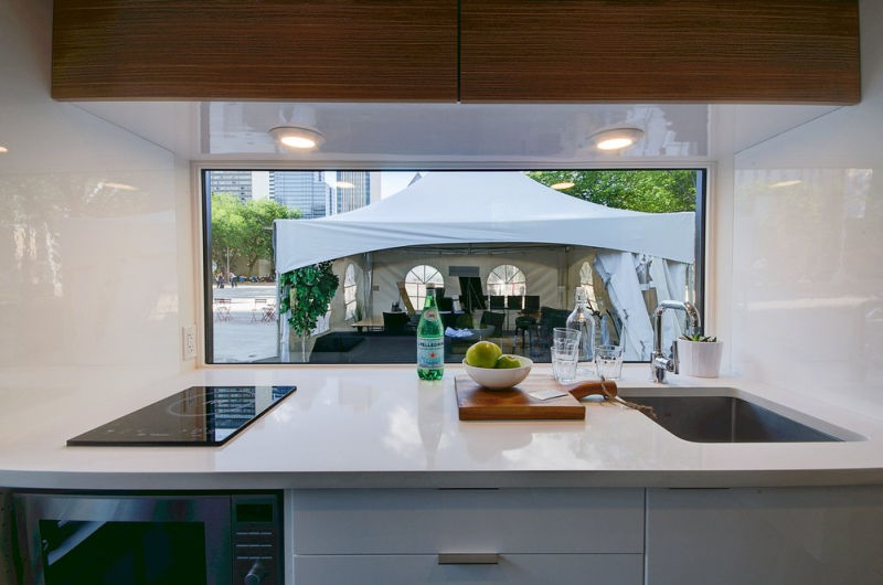 kitchen and bathroom areas are decorated with Quartz