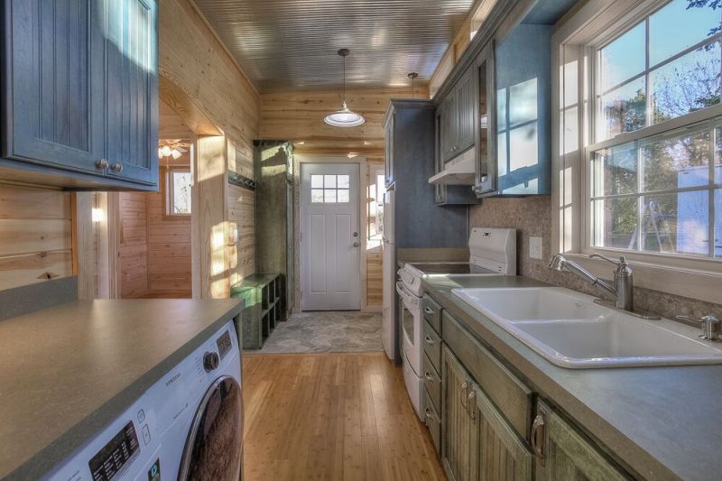 Laundry area inside shipping container home