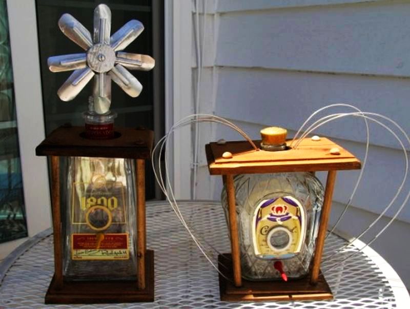 Liquor bottle birdhouses by Larry Keisling