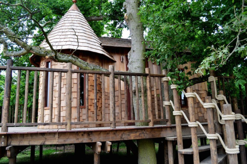 Nook treehouse in features sunken fire pit in the middle of amphitheatre seating 