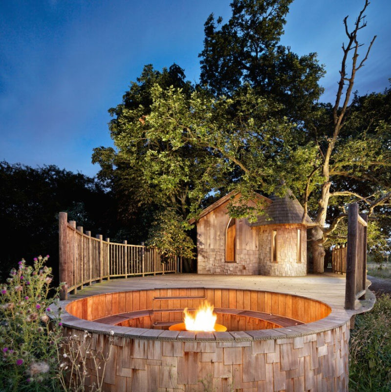 Nook treehouse in features sunken fire pit in the middle of amphitheatre seating 