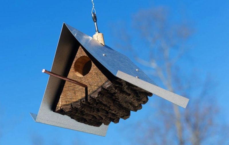 Rustic log quartered birdhouse