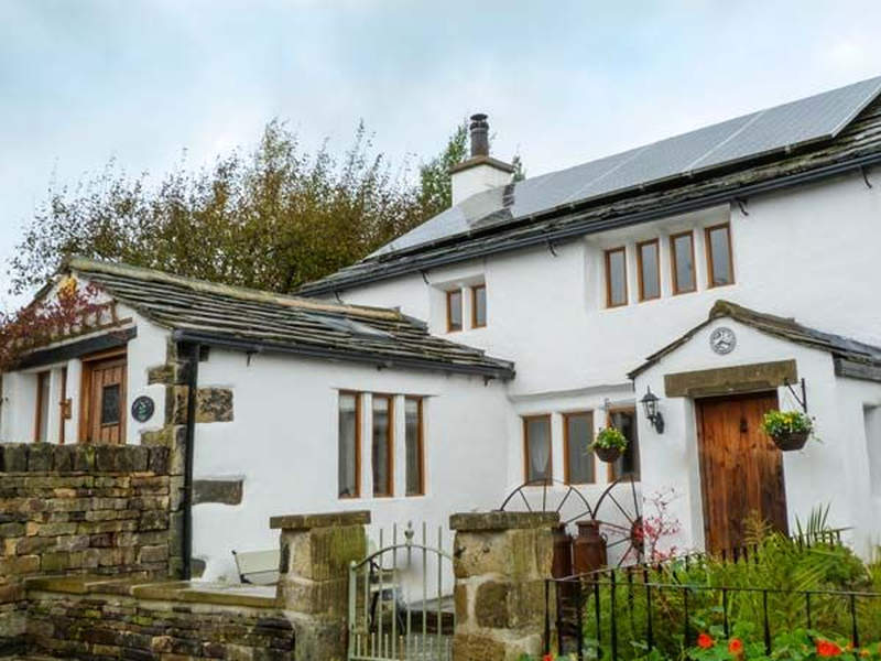 Brit couple transforms old garage into cozy holiday rental home 