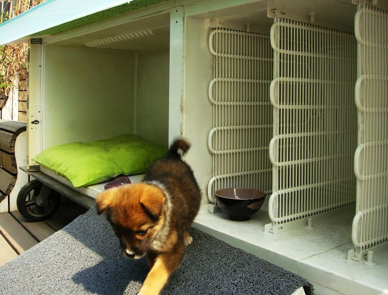 Doghouse recycled from old fridge.