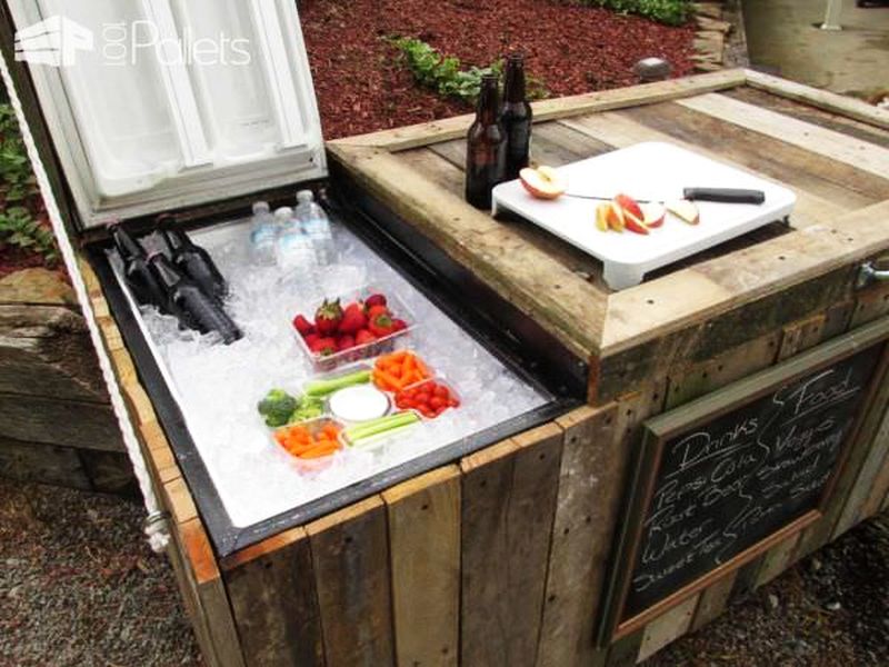 A rustic cooler from broken refrigerator and pallets