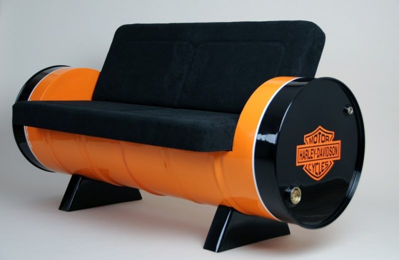 stylish sofa made of a large oil barrel with Harley Davidson logo 