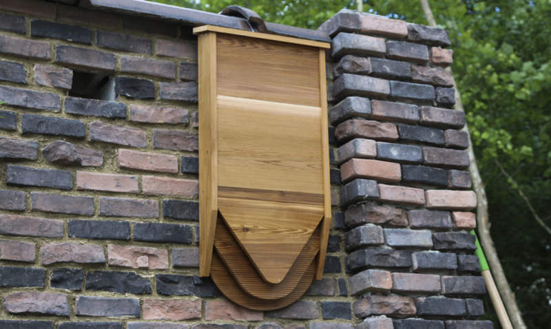 BatBnB is wooden birdhouse specifically designed for bats 