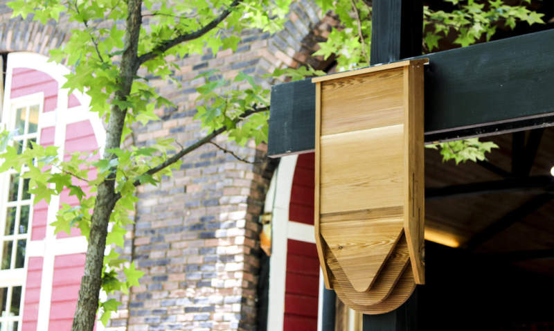 BatBnB is wooden birdhouse specifically designed for bats 