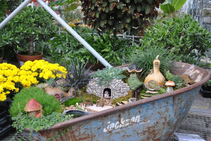 Old Bathtub into a mini village in your garden   