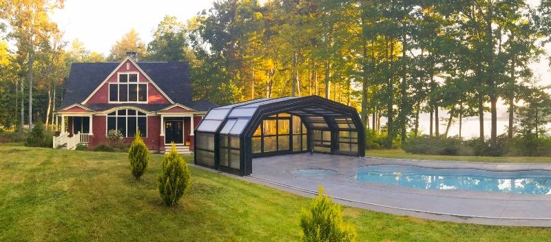 Libart retractable swimming pool roof for a house in picturesque Casco Bay