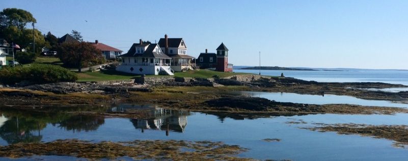 Libart retractable swimming pool roof for a house in picturesque Casco Bay