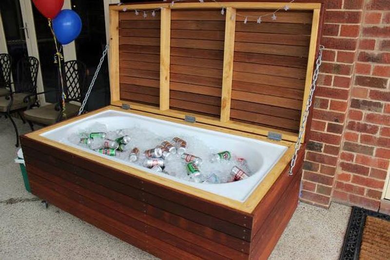 Old bathtub into food and beverage cooler