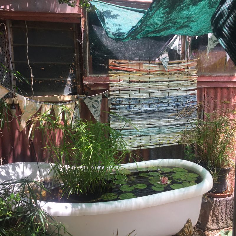 small garden pond from Old bathtub